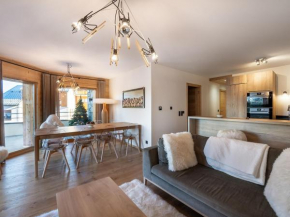 Appartement T4 à Courchevel, proche des pistes, avec terrasse, parking, et services inclus - FR-1-563-13